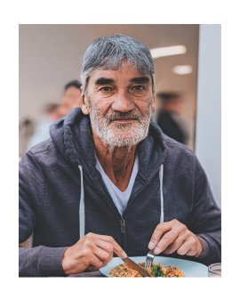 Man Smiling at Camera