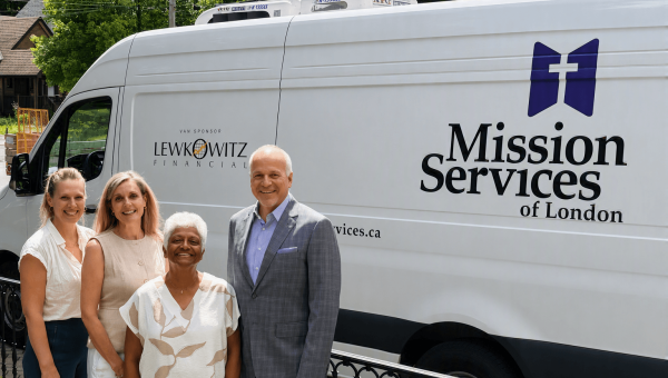 Robert Lewkowitz and staff in front of sponsored refrigerated van